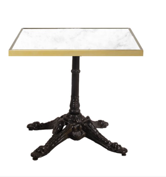 mesa de mármol blanco liso con canto oro y pie parís